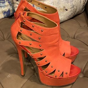 Michael Antonio orange heels
